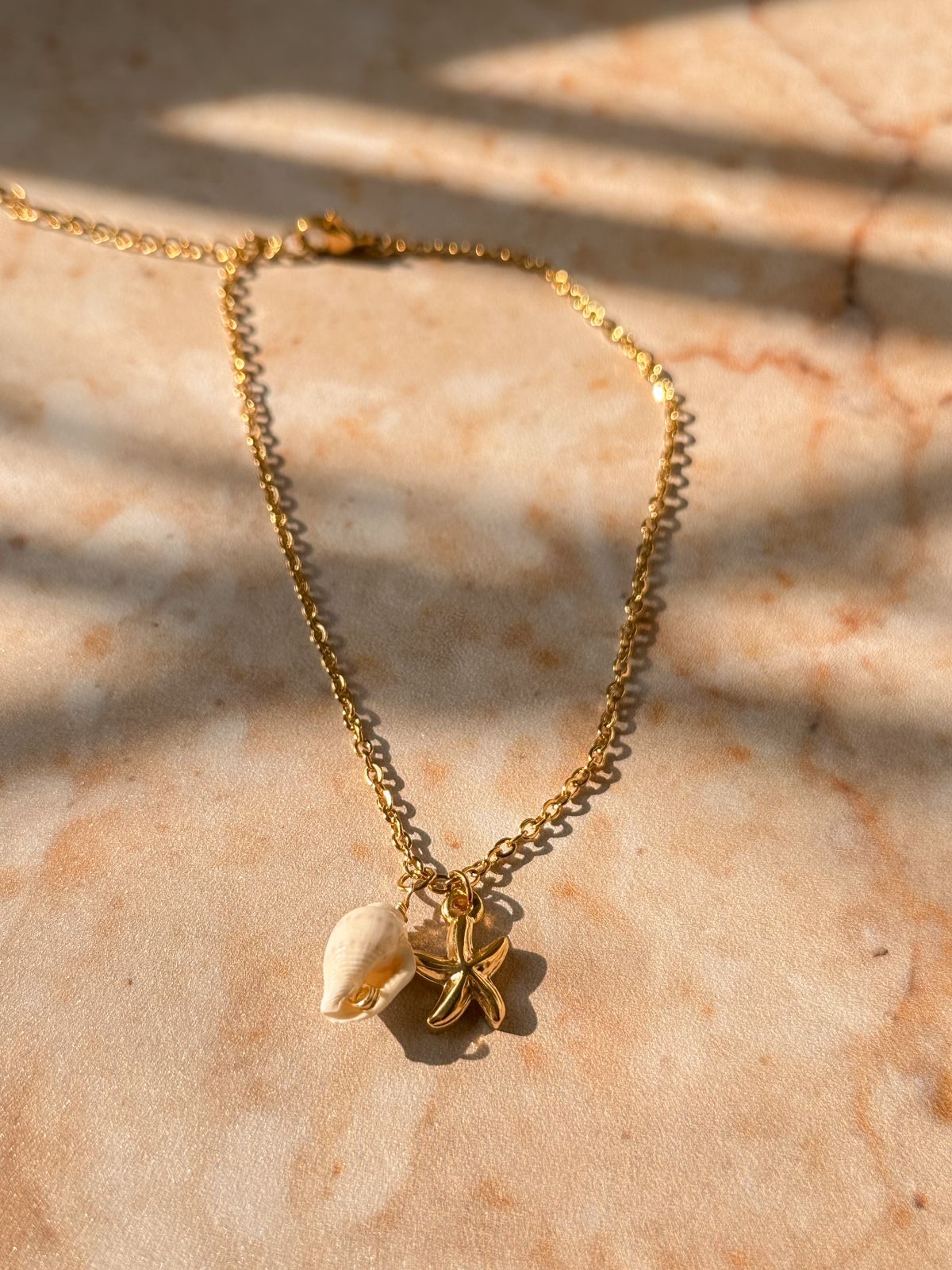 Tobillera estrella+caracol