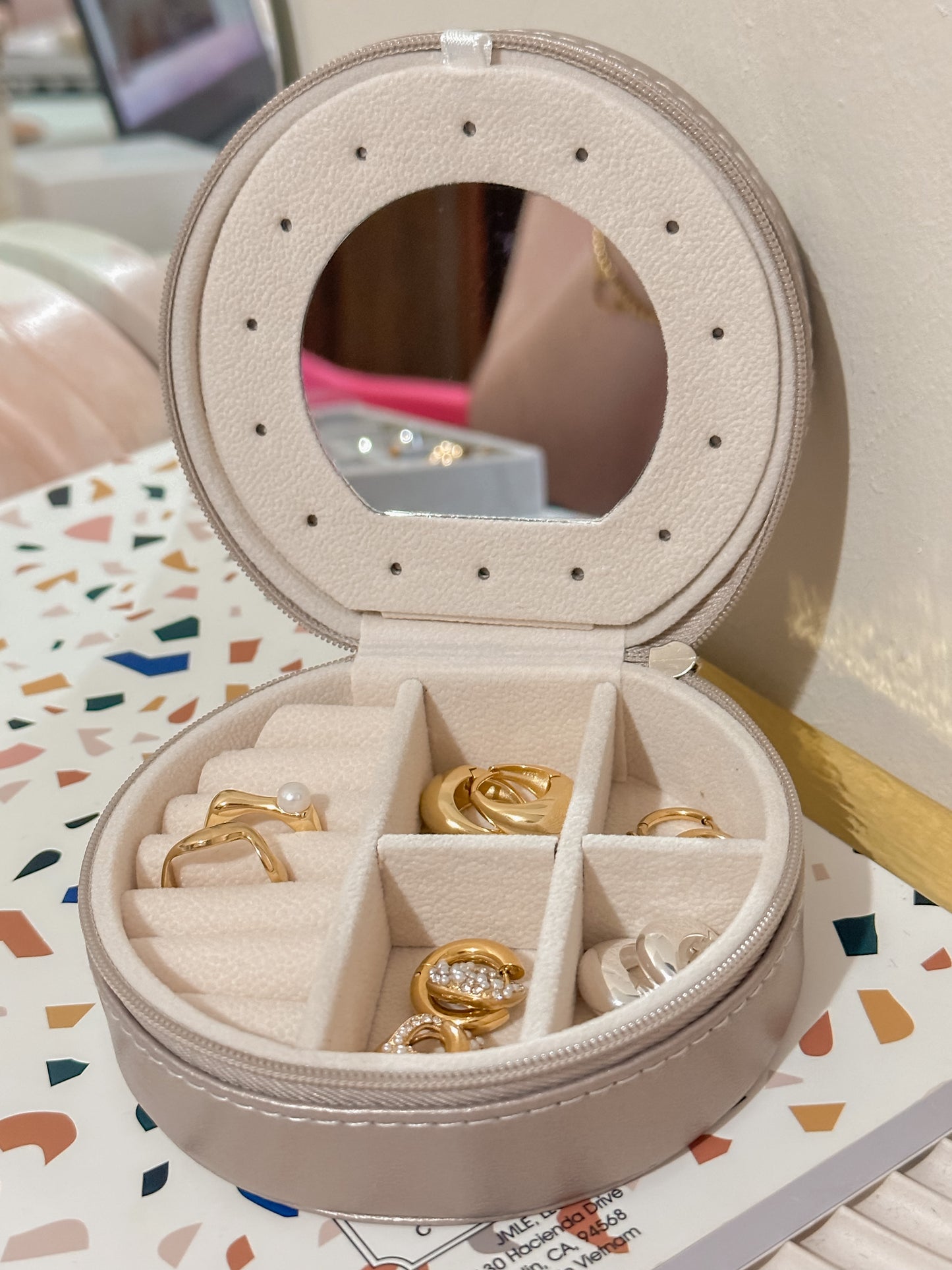 Round travel size jewelry box with mirror