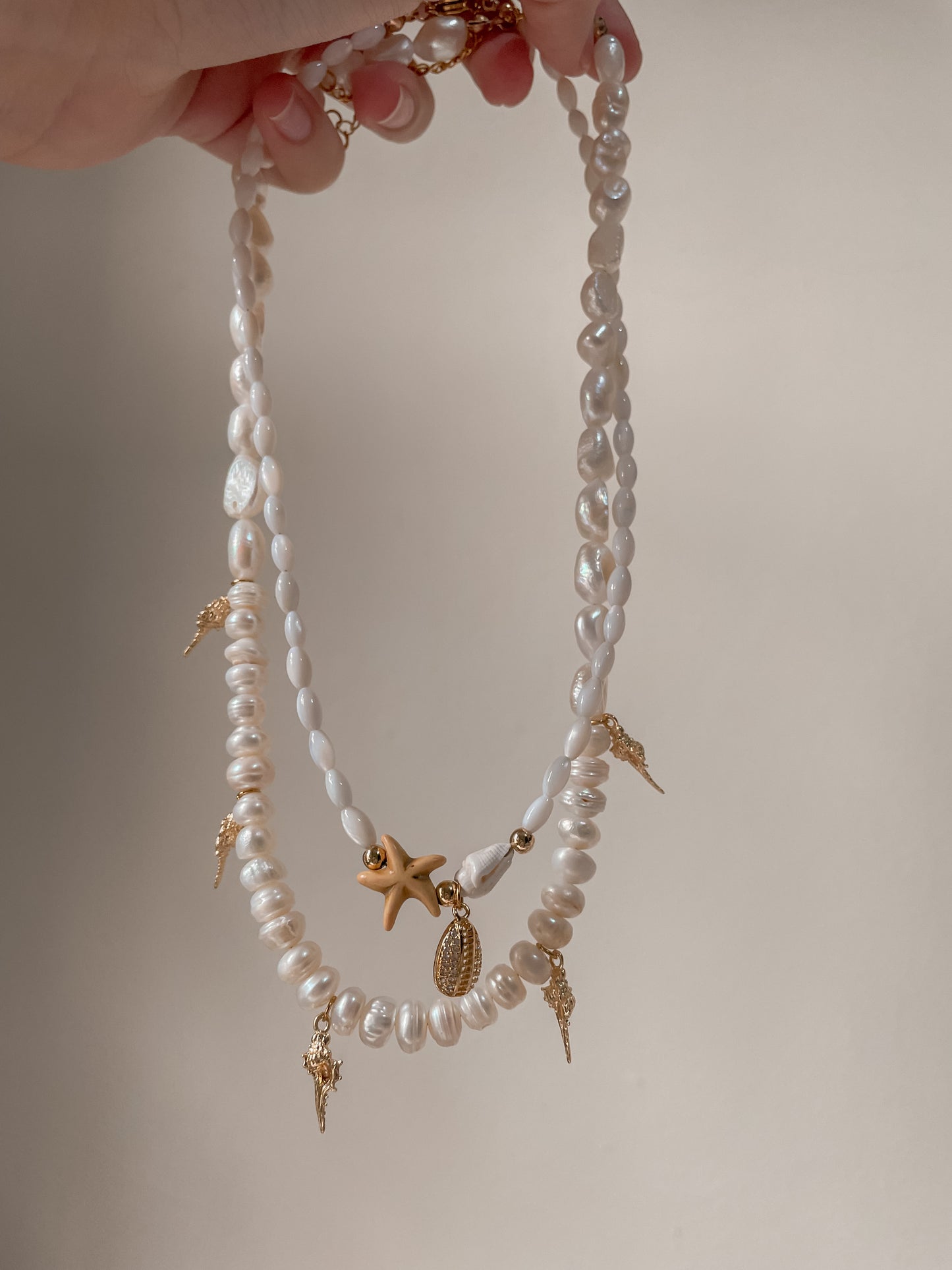 Caracoles y estrellas necklaces